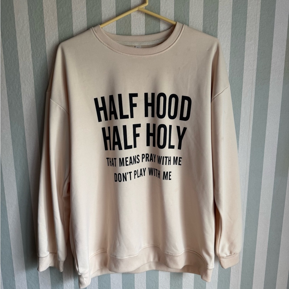 Cream Sweatshirt with Bold Black Text